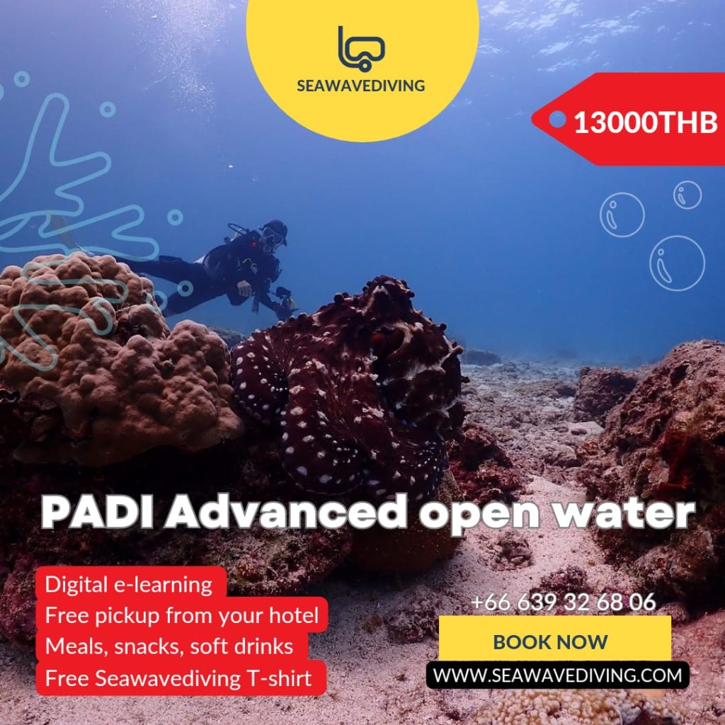PADI Advanced Open Water student descending with instructor in clear Phuket waters