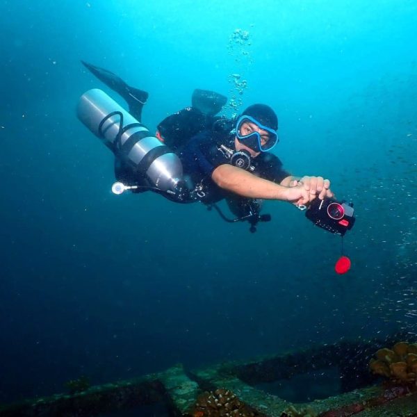 "Sidemount diver switching regulators to manage gas supply during dive"
