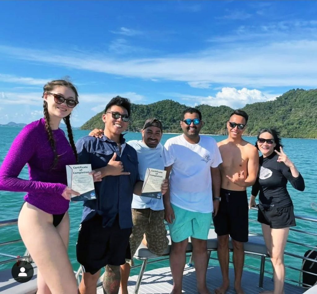 Divers boarding Seawave Diving’s boat for a day trip to Racha or King Cruiser